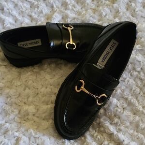 Steve Madden Glossy Black Loafers with Gold Detail